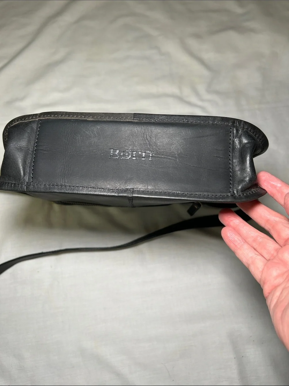 Born Black Leather Crossbody Bag with Gold Accents, Approximately 10.5x9.5